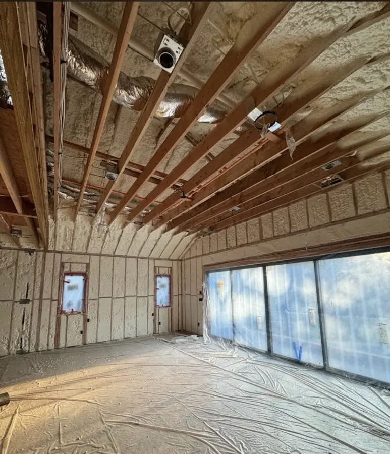 Interior walls and ceiling insulated with spray foam during new construction in Peachtree City